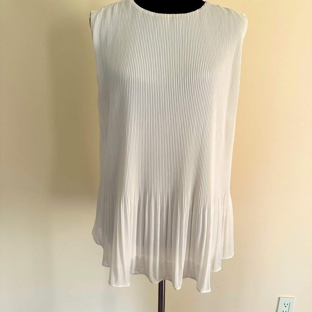 White pleated blouse